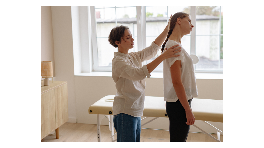 therapist helping with posture